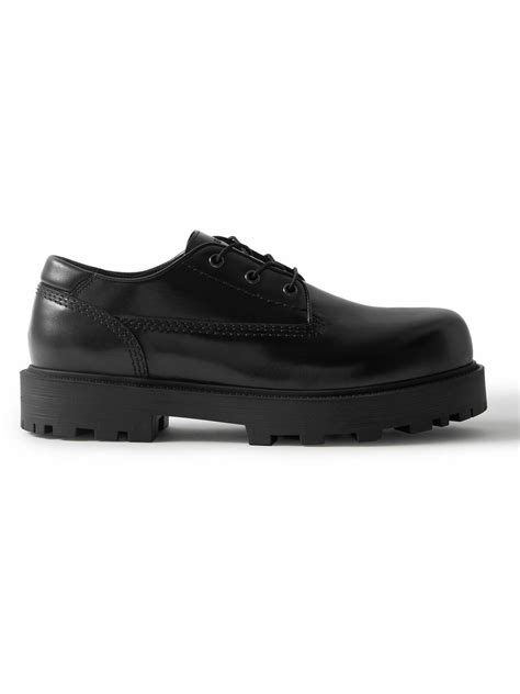 Storm leather derby shoes in black .